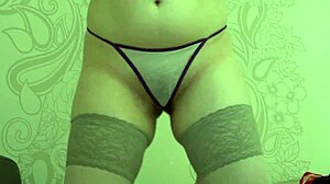 Amateur girl measures and pleasures herself with panties