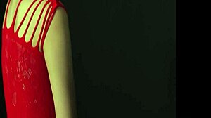 매력적인 가슴을 가진 아름다운 여성이 유혹적인 빨간 드레스를 입고 도발적인 자세로 유혹합니다